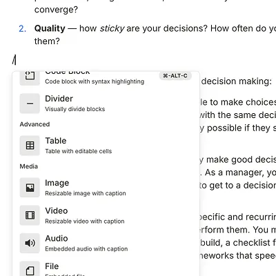 A Blocknote node with its slash-command menu open on the block types: divider, table, image, video, audio, file